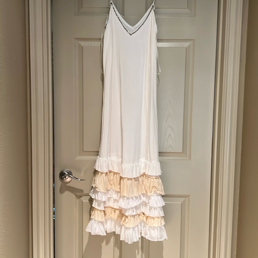 Long elegant dress ruffles at the bottom